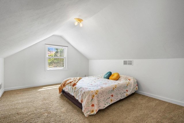129 Division St, Madison, WI 53704 - bedroom with carpet flooring and lofted ceiling