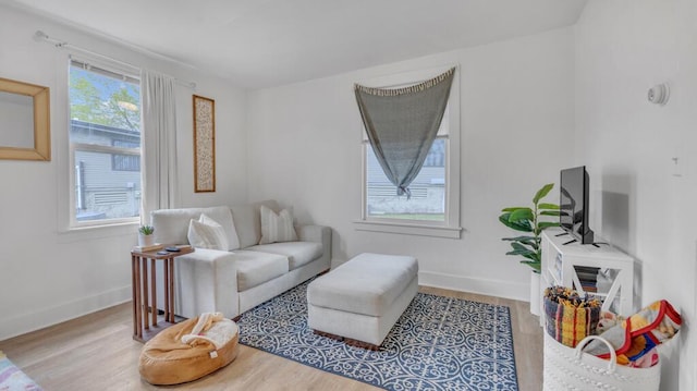 613 N 5th St Unit 611, Sheboygan, WI 53081 - living area featuring wood finished floors and baseboards