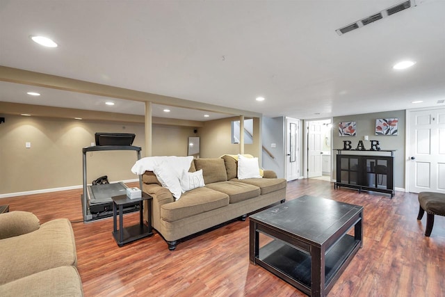 3813 S Clay St, Green Bay, WI 54301 - living room featuring wood finished floors, baseboards, recessed lighting, and stairway