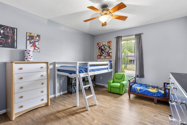 763 Severndroog Way, Howard, WI 54313 - bedroom with light wood finished floors, baseboards, and ceiling fan