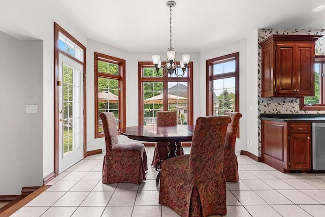 139 Sullivan Ln, De Pere, WI 54115 - dining space featuring a chandelier, light tile patterned floors, and baseboards