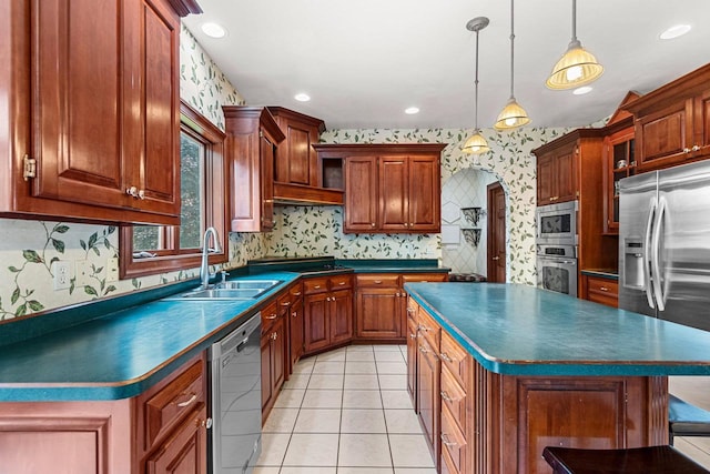 139 Sullivan Ln, De Pere, WI 54115 - kitchen featuring wallpapered walls, stainless steel appliances, dark countertops, a sink, and light tile patterned floors