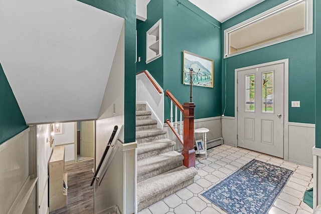 1123 S Park Ave, Neenah, WI 54956 - entrance foyer with a wainscoted wall, a baseboard radiator, and stairway