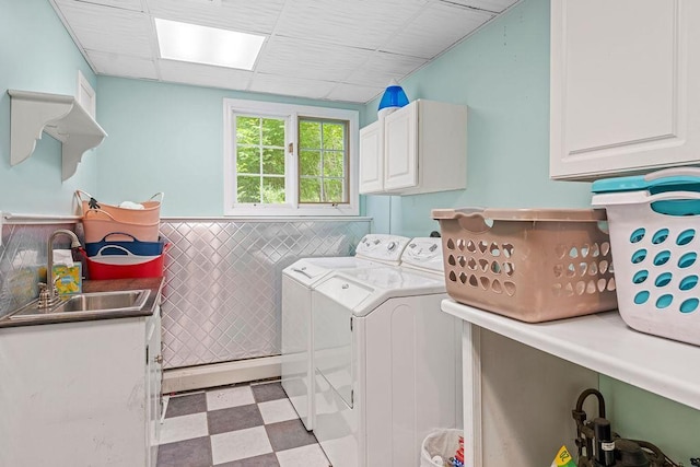 1123 S Park Ave, Neenah, WI 54956 - laundry area with cabinet space, separate washer and dryer, light floors, and wainscoting