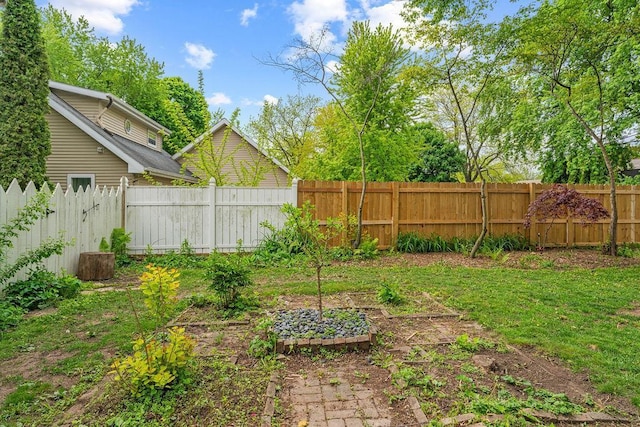 1123 S Park Ave, Neenah, WI 54956 - fenced backyard with a vegetable garden
