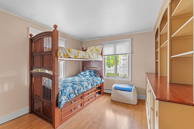 1123 S Park Ave, Neenah, WI 54956 - bedroom with wood finished floors, crown molding, baseboards, and a baseboard radiator