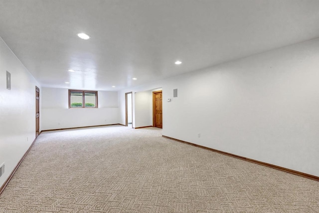 1411 Cocos, Green Bay, WI 54313 - spare room featuring recessed lighting, light colored carpet, and baseboards