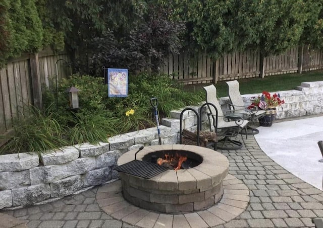10 Vienna Cir, Madison, WI 53718 - view of patio with an outdoor fire pit