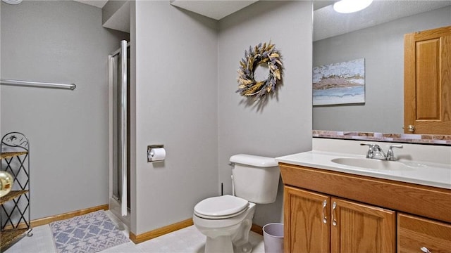 E3313 Jennifer Ln, Eau Claire, WI 54701 - bathroom featuring vanity, a shower stall, and toilet