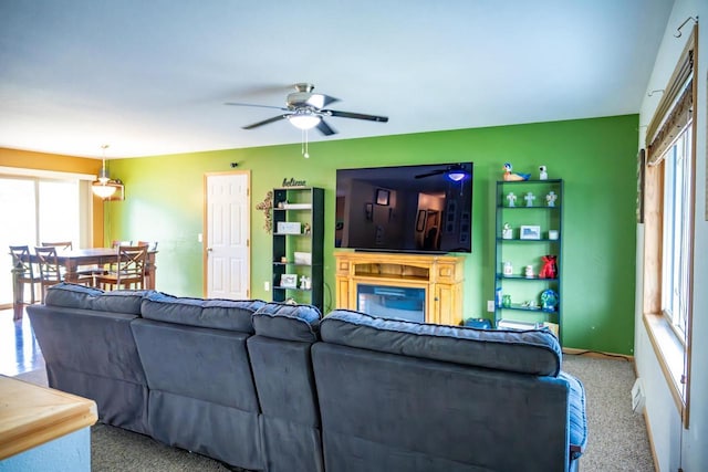 2371 Doris Rd, Reedsburg, WI 53959 - living room featuring ceiling fan and carpet