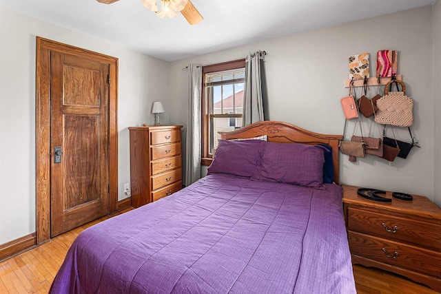 157 E 11th St, Fond Du Lac, WI 54935 - bedroom with light wood-style flooring, ceiling fan, and baseboards