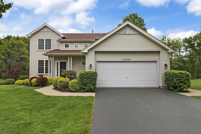 20506 83rd Pl, Bristol, WI 53104 - traditional-style home with asphalt driveway, an attached garage, and a front lawn