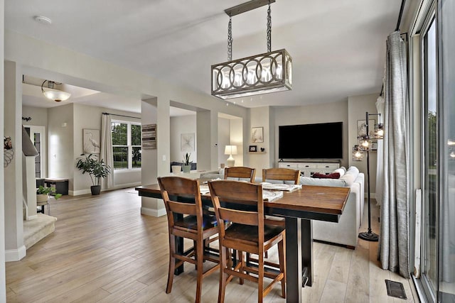20506 83rd Pl, Bristol, WI 53104 - dining room featuring light wood-type flooring and baseboards