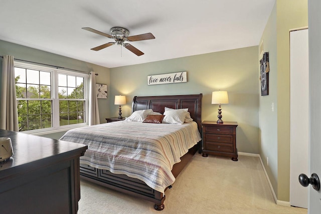 20506 83rd Pl, Bristol, WI 53104 - bedroom with baseboards, light colored carpet, and a ceiling fan
