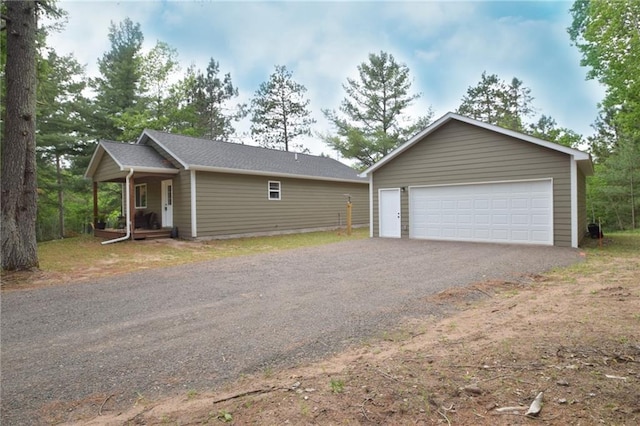 3542 Treasure Island Ter, Danbury, WI 54830 - detached garage featuring covered porch