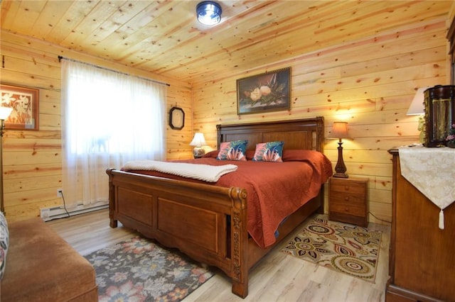 3542 Treasure Island Ter, Danbury, WI 54830 - bedroom featuring wooden ceiling, wood walls, light wood finished floors, and a baseboard heating unit