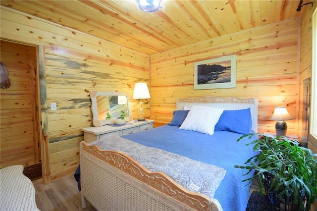 3542 Treasure Island Ter, Danbury, WI 54830 - bedroom featuring wooden ceiling, wood finished floors, and wood walls