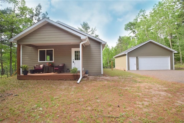 3542 Treasure Island Ter, Danbury, WI 54830 - view of front of home with a garage, covered porch, and an outbuilding