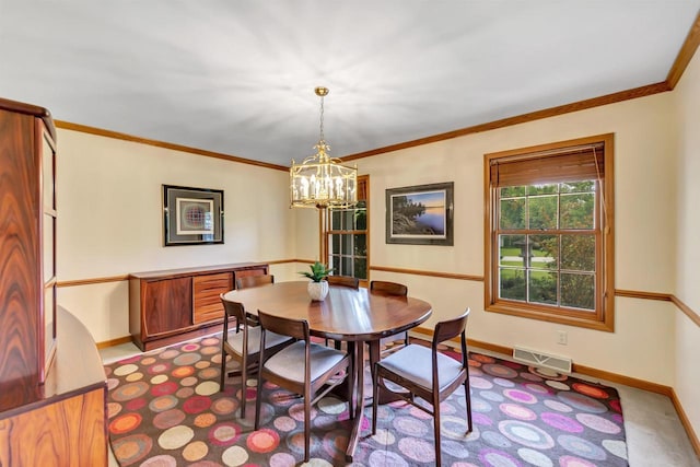 4514 Mohawk Ct, Green Bay, WI 54313 - dining room featuring a chandelier, baseboards, crown molding, and carpet