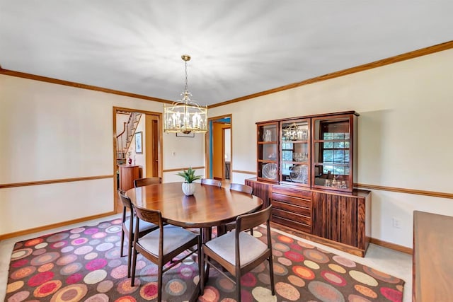4514 Mohawk Ct, Green Bay, WI 54313 - dining area featuring a chandelier, ornamental molding, baseboards, and carpet