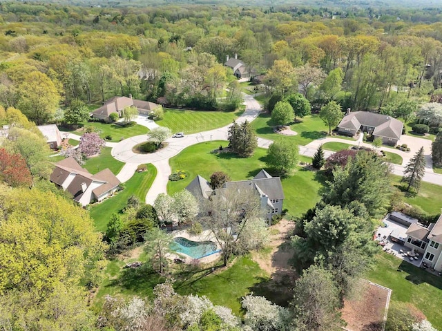 4514 Mohawk Ct, Green Bay, WI 54313 - aerial view of property's location featuring a heavily wooded area and a pool area