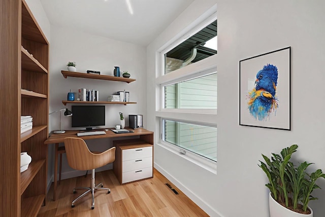 3644 W Hank Ave, De Pere, WI 54115 - home office featuring light wood-style flooring and baseboards
