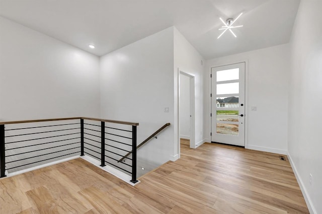 3644 W Hank Ave, De Pere, WI 54115 - foyer featuring wood finished floors and baseboards