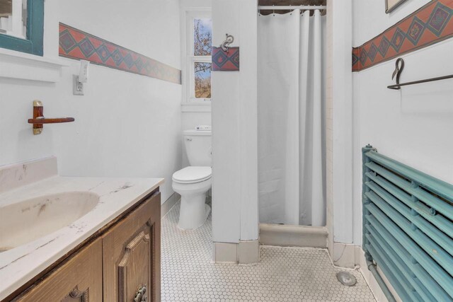 1616 7th St, Menomonie, MI 49858 - full bathroom featuring toilet, vanity, and a shower with curtain