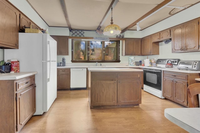 1616 7th St, Menomonie, MI 49858 - kitchen with white appliances, beam ceiling, light wood-style floors, a sink, and light countertops