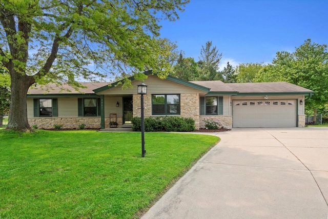 4062 S 106th St, Greenfield, WI 53228 - ranch-style house featuring stone siding, a garage, driveway, and a front yard
