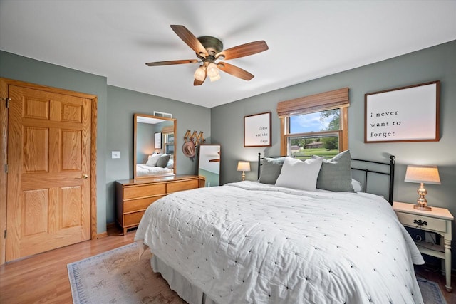 4062 S 106th St, Greenfield, WI 53228 - bedroom featuring light wood finished floors, ceiling fan, and baseboards