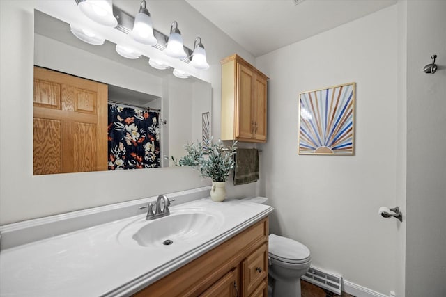 4062 S 106th St, Greenfield, WI 53228 - full bathroom with vanity, toilet, and baseboards