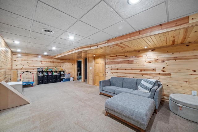4062 S 106th St, Greenfield, WI 53228 - living room featuring wood walls, carpet, and recessed lighting