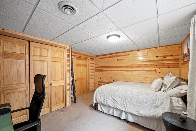 4062 S 106th St, Greenfield, WI 53228 - carpeted bedroom featuring wooden walls and a closet