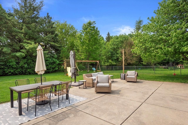 4062 S 106th St, Greenfield, WI 53228 - view of patio / terrace with outdoor lounge area, outdoor dining space, a playground, and view of wooded area