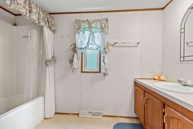 1630 Hawkshead Trl, Nekoosa, WI 54457 - bathroom featuring vanity, shower / bath combo with shower curtain, tile patterned floors, and ornamental molding