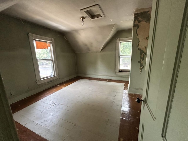 1108 6th St, Beloit, WI 53511 - bonus room with vaulted ceiling, plenty of natural light, baseboards, and hardwood / wood-style floors