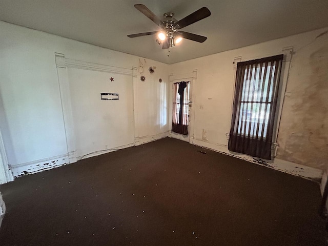 1108 6th St, Beloit, WI 53511 - unfurnished room with a ceiling fan and dark carpet