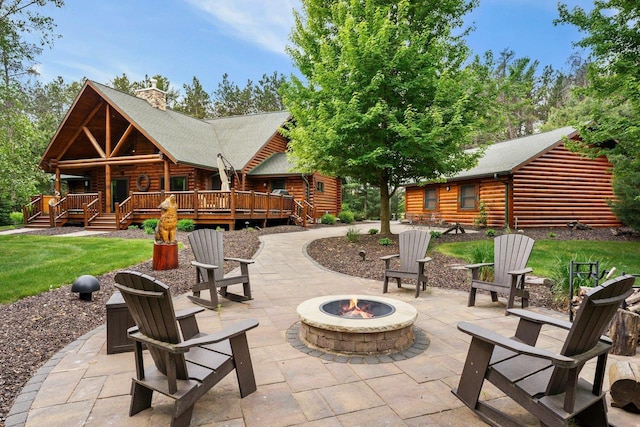 W6034 N Lake Dr, New Lisbon, WI 53950 - view of patio with a fire pit and a deck