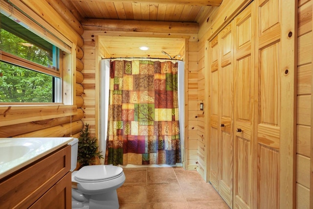 W6034 N Lake Dr, New Lisbon, WI 53950 - bathroom featuring rustic walls, wood ceiling, vanity, curtained shower, and toilet