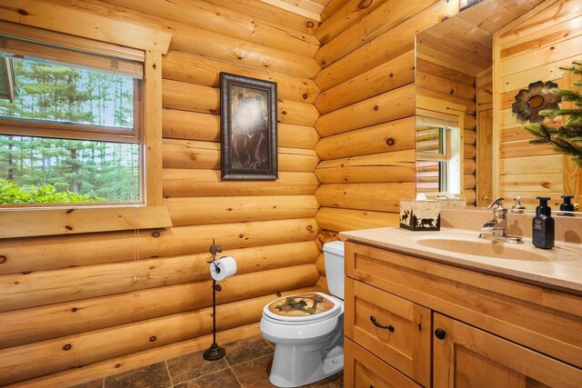 W6034 N Lake Dr, New Lisbon, WI 53950 - bathroom with toilet, vanity, and tile patterned floors