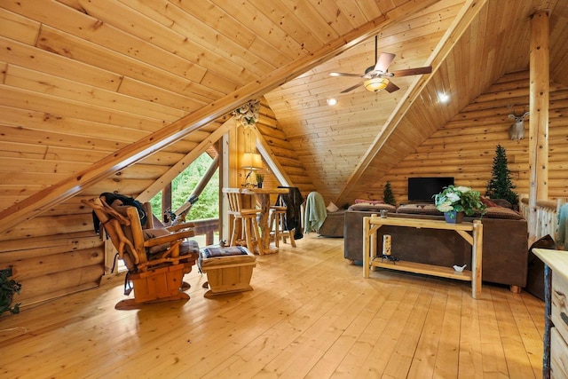W6034 N Lake Dr, New Lisbon, WI 53950 - living area with rustic walls, wood ceiling, light wood-type flooring, vaulted ceiling, and ceiling fan