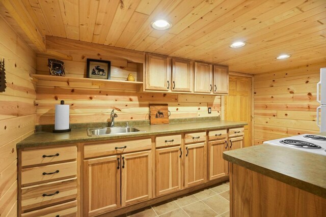 W6034 N Lake Dr, New Lisbon, WI 53950 - kitchen with a sink, wood ceiling, wooden walls, open shelves, and light tile patterned floors