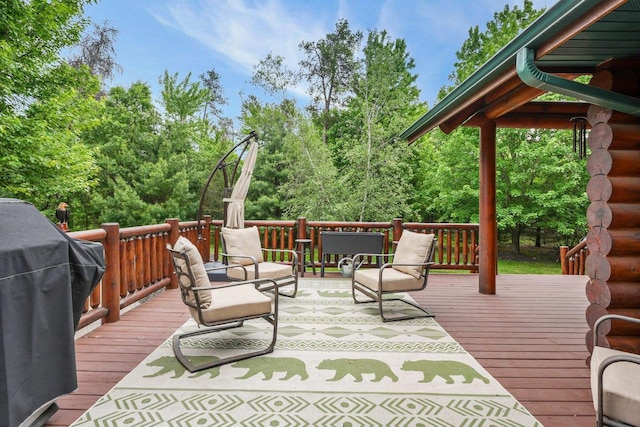 W6034 N Lake Dr, New Lisbon, WI 53950 - wooden terrace featuring area for grilling