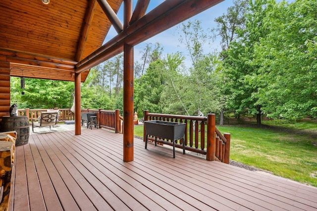 W6034 N Lake Dr, New Lisbon, WI 53950 - wooden terrace with a yard and view of wooded area