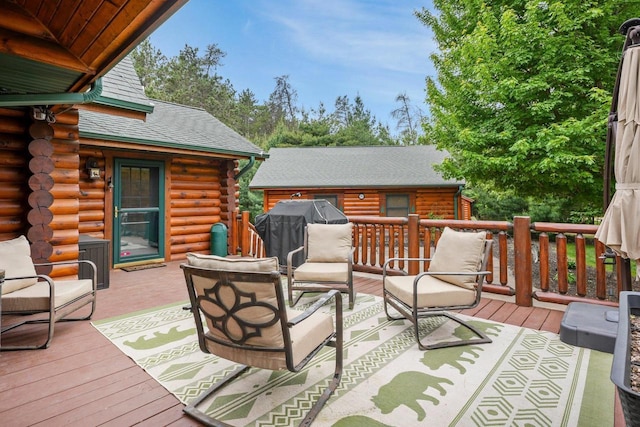 W6034 N Lake Dr, New Lisbon, WI 53950 - wooden deck featuring a grill and an outdoor living space