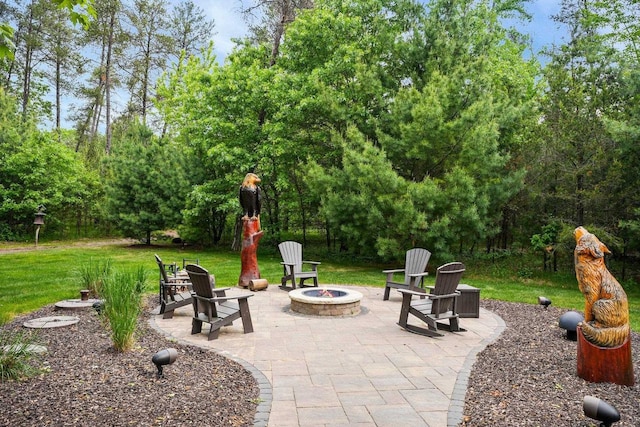 W6034 N Lake Dr, New Lisbon, WI 53950 - view of patio featuring a fire pit