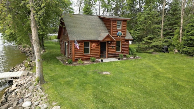 9213 Willow Ln, Fremont, WI 54940 - log cabin with a water view, a front yard, and roof with shingles