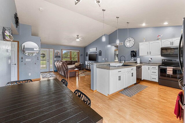 782 Mustang Ln, Fond Du Lac, WI 54935 - kitchen with range with electric stovetop, a sink, black microwave, a peninsula, and dishwashing machine