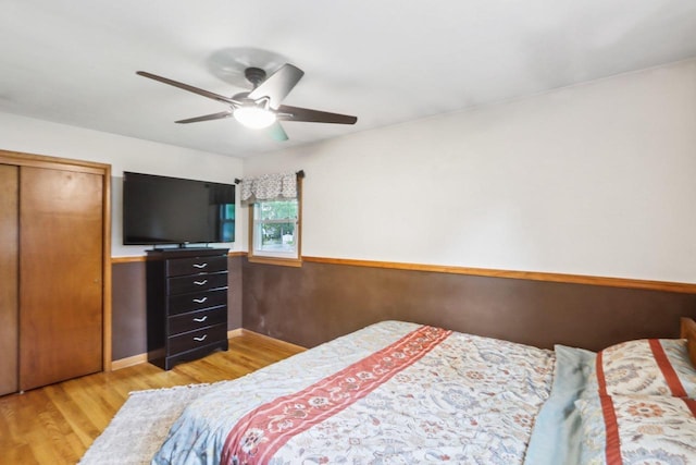 109 County Park Rd, Waupun, WI 53963 - bedroom with light wood-type flooring, baseboards, a ceiling fan, and a closet